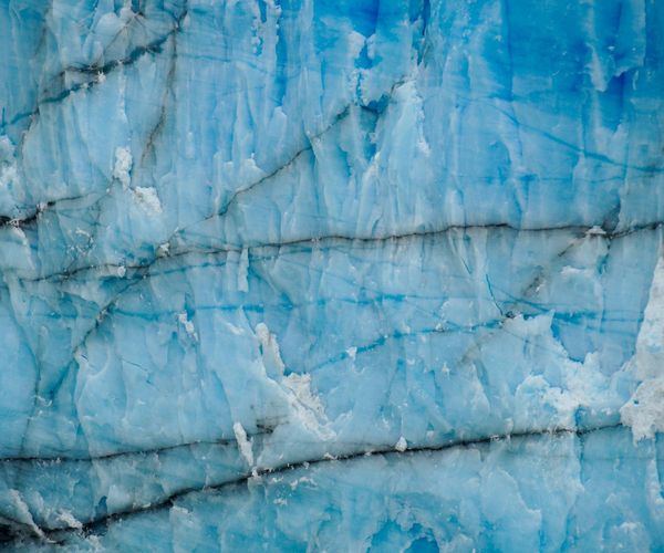 Abstract ice structures glowing with cold blue light